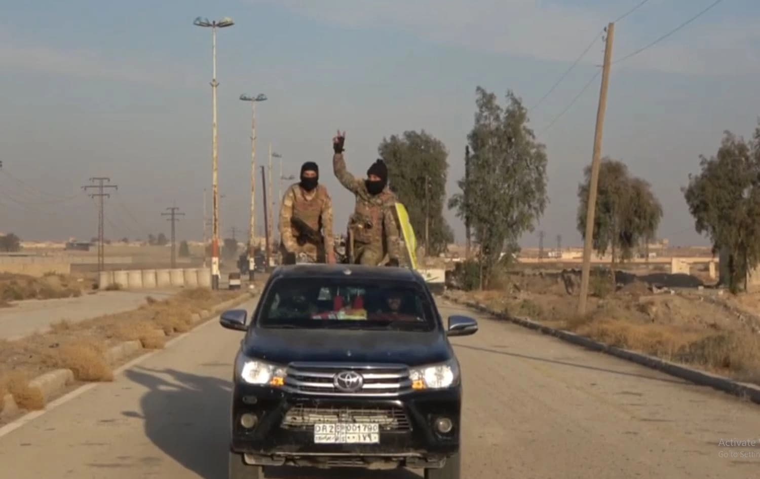Screengrab from a video published by the Kurdish-led Syrian Democratic Forces (SDF) shows SDF fighters entering the city of Deir ez-Zor in eastern Syria after the withdrawal of regime forces and pro-Iran militias. Photo: SDF