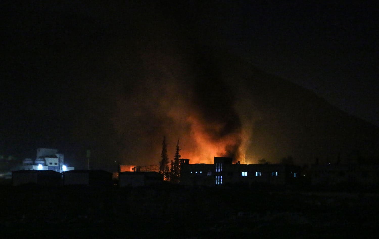 Smoke billows on the outskirts of the Syrian capital Damascus following Israeli airstrikes on December 9, 2024. Photo: Aaref WATAD / AFP