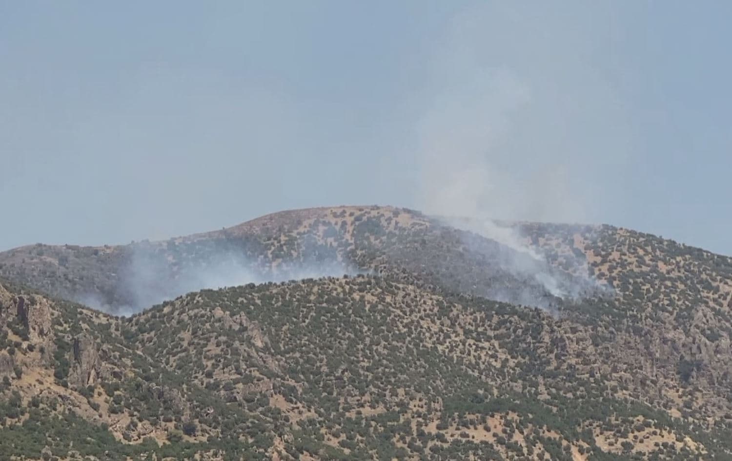 Wildfires caused by Turkish bombardment near Amedi town in Duhok province on August 7, 2024. Photo: Rudaw