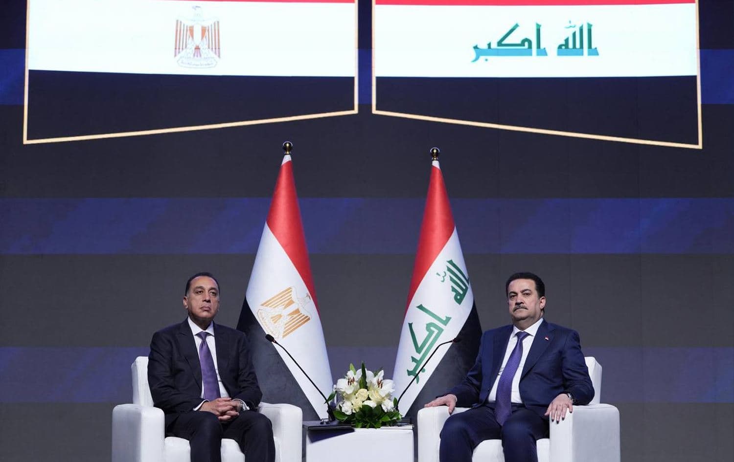 Iraqi PM Mohammed Shia’ al-Sudani (right) and Egytian PM Mostafa Madbouly (left) at the Iraqi-Egyptian Economic Forum in Baghdad on January 30, 2025. Photo: Sudani’s office
