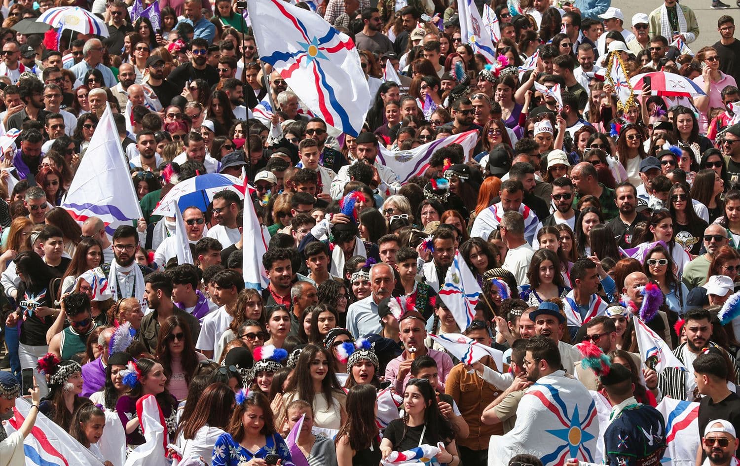 People from the Assyrian, Chaldean, and Syriac community gather in Duhok province to celebrate Akitu – the Assyrian-Babylonian New Year – on April 1, 2025. Photo: Safin Hamid/AFP