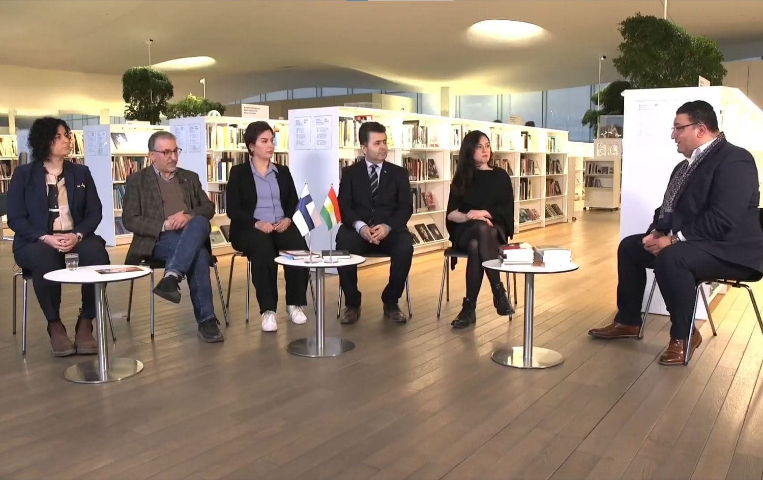 From left: Shayda Sohrabi, a candidate for Finland's National Coalition party, Majid Haqqi, an elections and Kurdish diaspora in Finland expert, Shahen Zada Ahmed, a Social Democratic candidate, Welat Nehri, former president of the Federation of Kurdish Associations in Finland, and Shina Rezavi, a refugee affairs and human rights specialist, in a debate with Rudaw's Hemin Abdullah on April 11, 2025. Photo: Rudaw