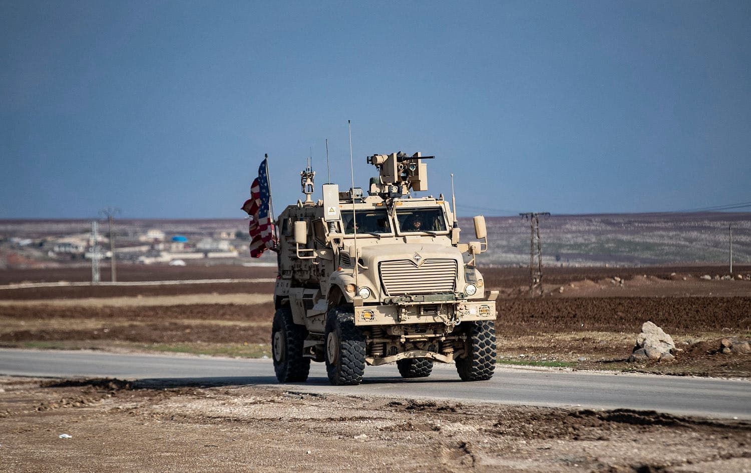 US troops patrol near the countryside of Rumeylan in northeastern Syria's Hasaka province near the Turkish border on December 2, 2024. Photo: AFP
