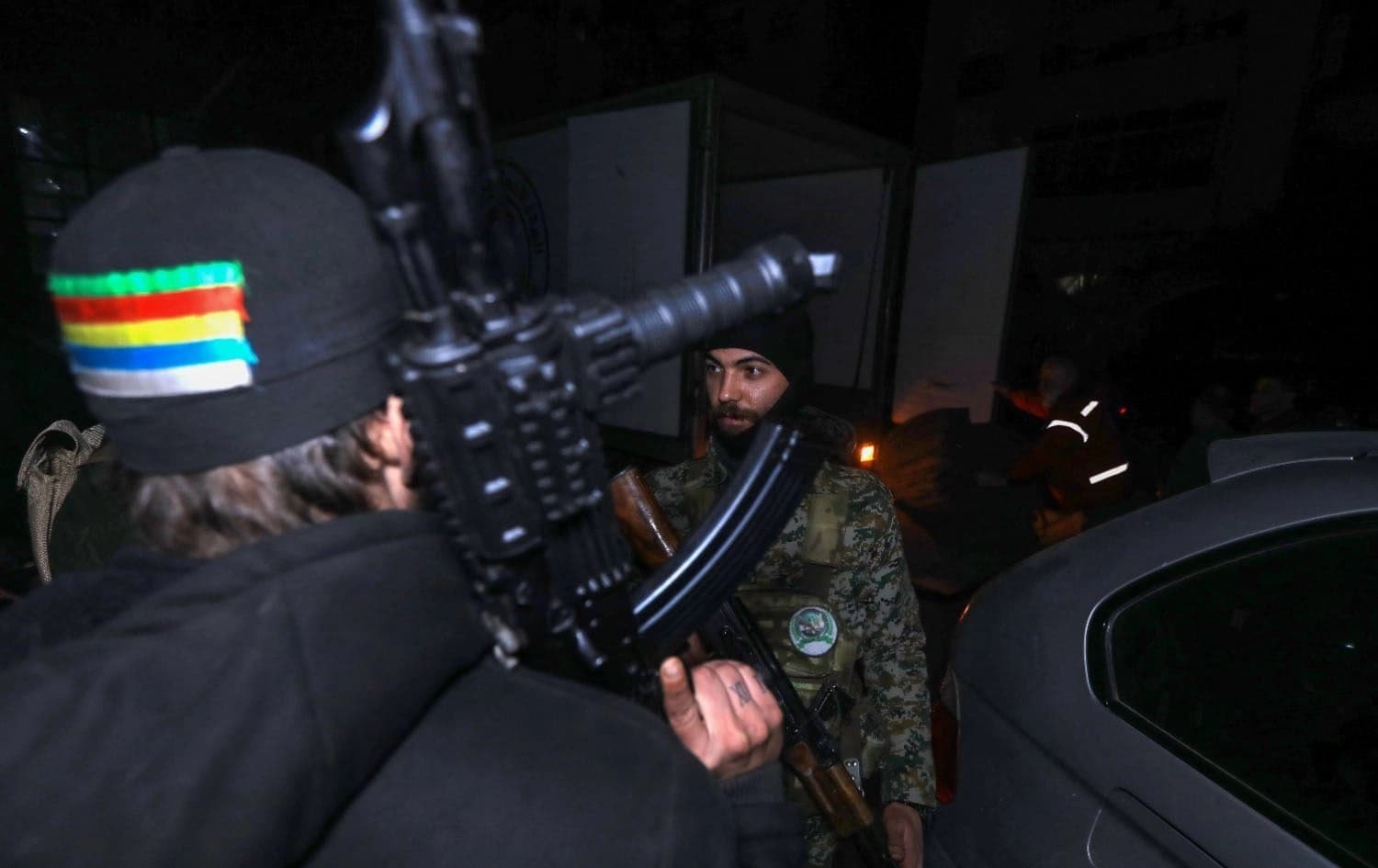 Members of Syria's new authorities security forces deploy in the mostly Druze and Christian Jaramana suburb of Damascus late on March 2, 2025. Photo: AFP