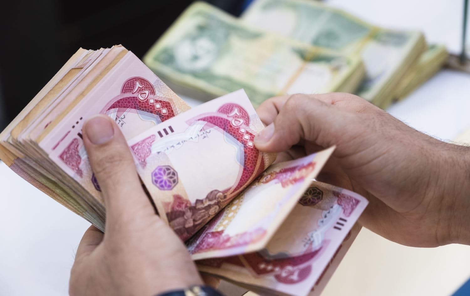 Iraq dinar notes. Photo: Rudaw