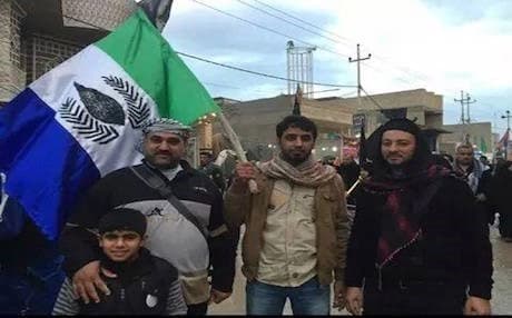Residents of Basra show the regional flag that has been circulating on social media websites. Photo: Facebook