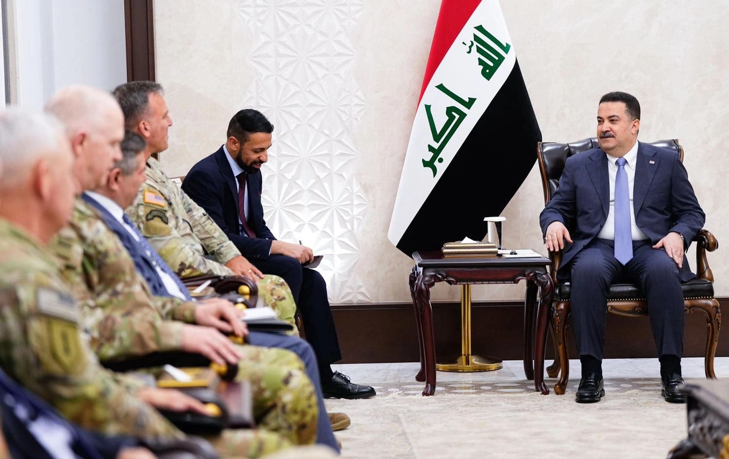 Iraqi Prime Minister Mohammed Shia’ al-Sudani meeting with incoming and outgoing commanders of anti-ISIS coalition as well as US officials and commanders in Baghdad on July 21, 2025. Photo: Sudani's office.