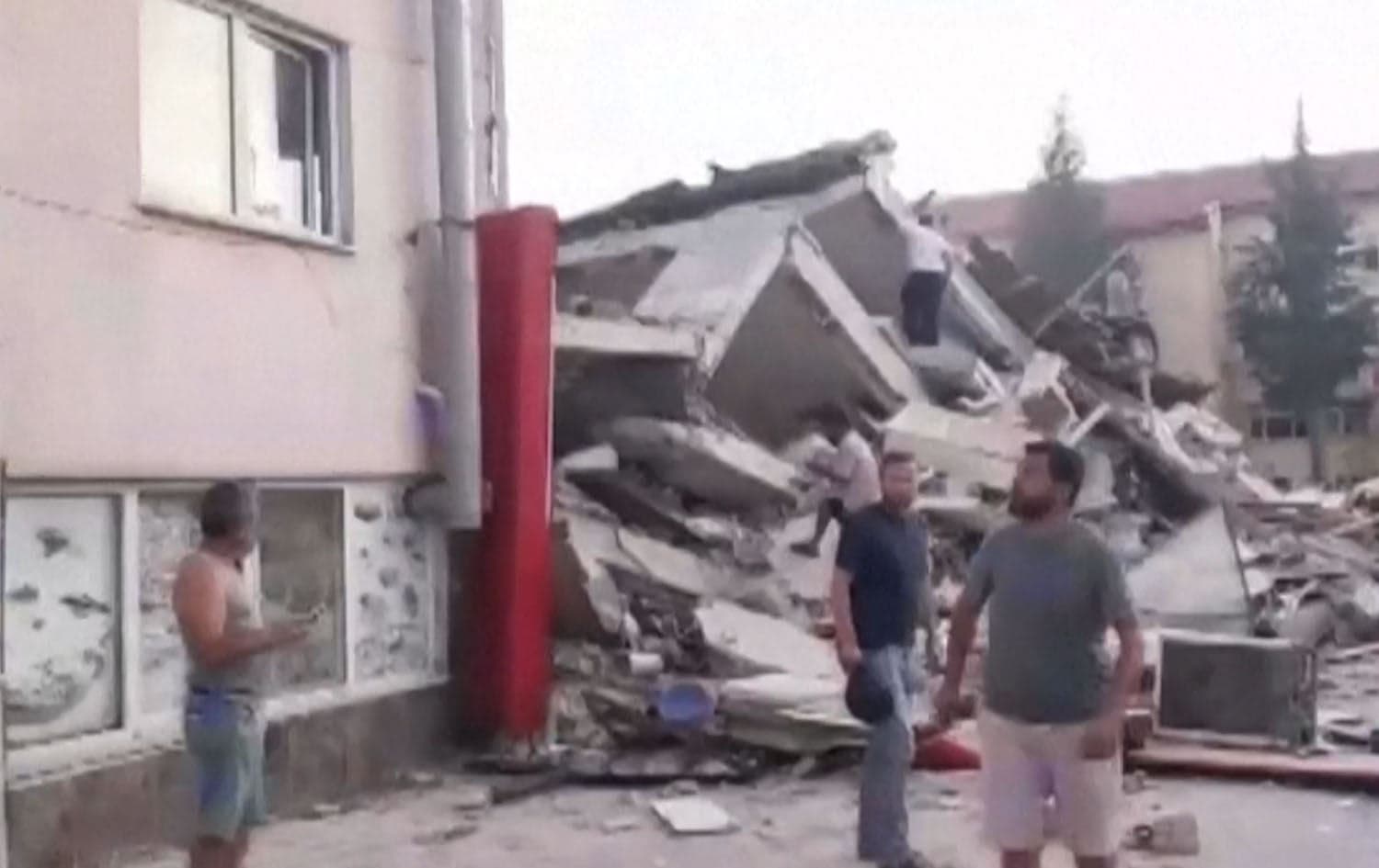 Image published by DHA shows damage and rescue efforts in Turkey's Balikesir province after a 6.1-magnitude quake on August 10, 2025. Photo: Screengrab/AFP