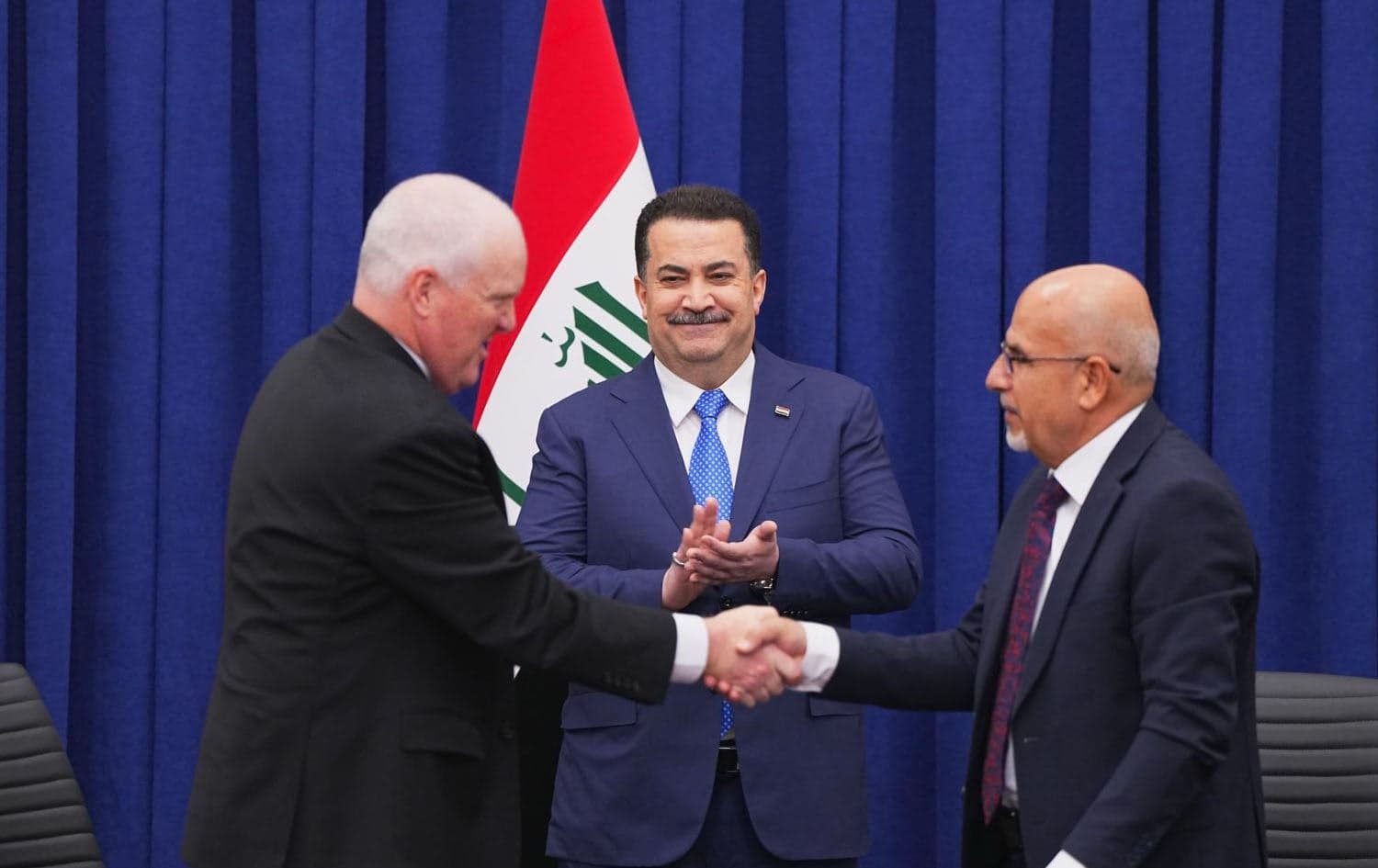 Iraqi Prime Minister Mohammed Shia’ al-Sudani (center) overseeing the signing of a deal between Iraq’s oil ministry and Chevron Corporation, in Baghdad on August 19, 2025. Photo: Sudani’s office