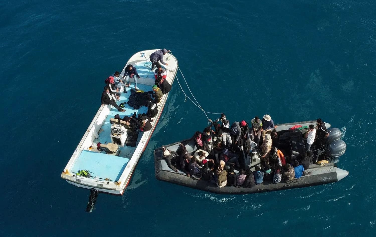 AFP file photo of a group of migrants near Libyan waterways.