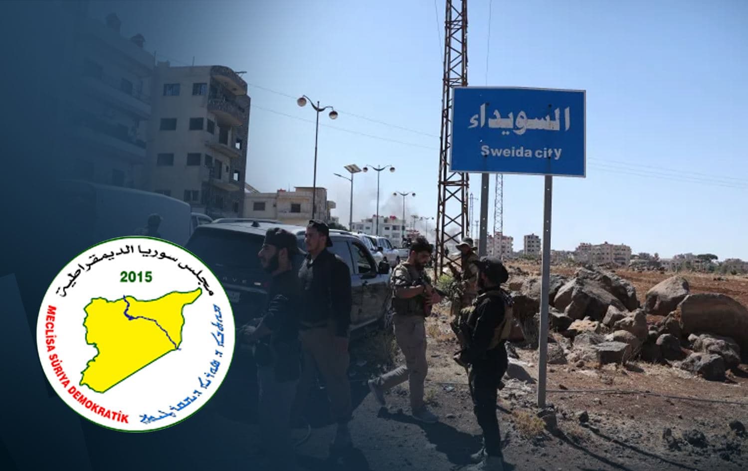 Kurdish-led Syrian Democratic Council (SDC) logo alongside a photo of Syrian security forces deployed in the predominantly Druze city of Suwayda in southern Syria. Photo: AFP