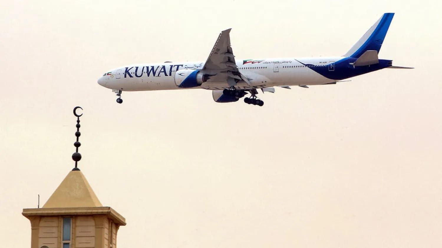A Kuwait Airways Boeing B777 aircraft prepares to land at Kuwait International Airport in Kuwait City on March 13, 2019. AFP file photo