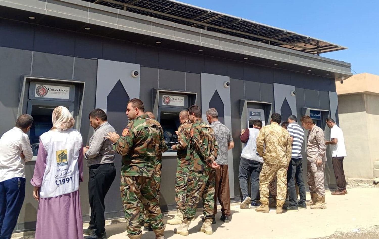 Civil servants in the Kurdistan Region withdraw their salaries from ATMs in northern Duhok province in May 15, 2025. File photo: KRG