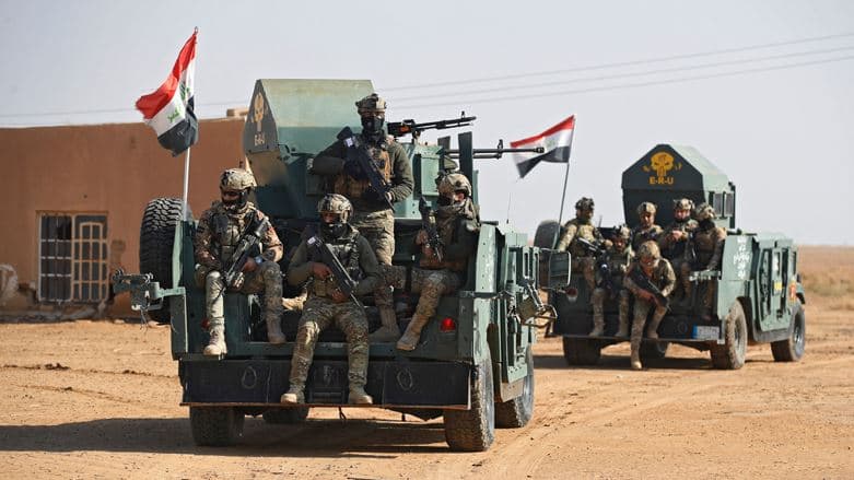 Members of Iraq's Rapid Intervention forces driving in a village in the Hawi al-Azim area, in the eastern Diyala province in January 2022. AFP file photo