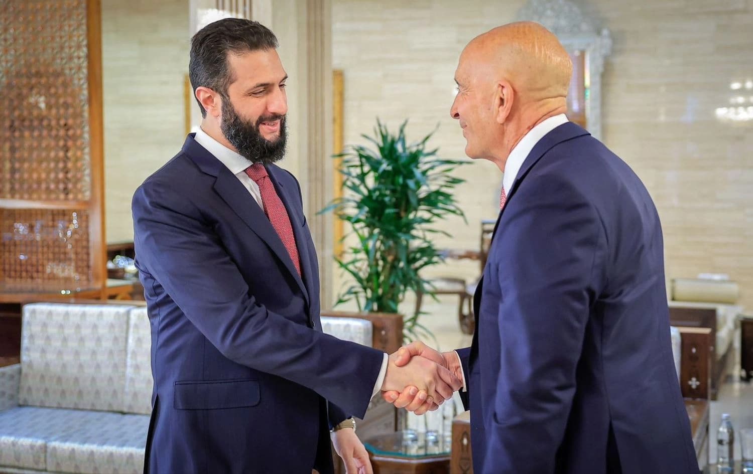 Syrian interim President Ahmed al-Sharaa (left) receiving US Special Envoy for Syria Tom Barrack (right) in Damascus on December 1, 2025. Photo: Syrian presidency