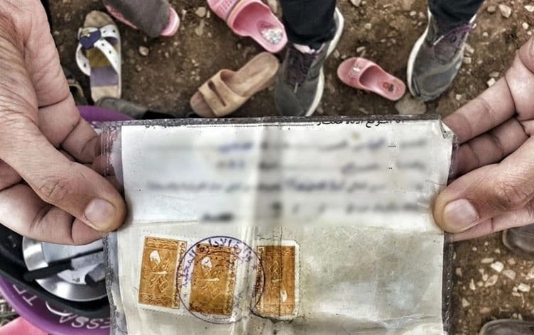 Suriye hükümetinin kimliksiz Kürtlere verdiği belge Foto: Rûdaw