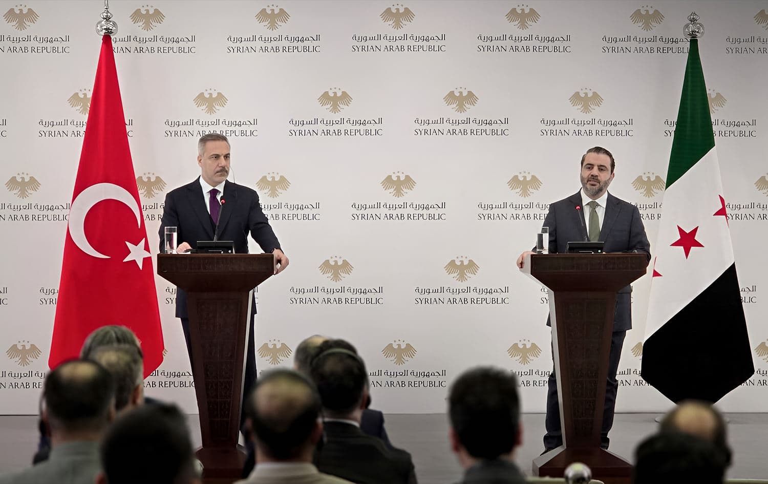 Turkish Foreign Minister Hakan Fidan (left) pictured during a joint presser with his Syrian counterpart Asaad al-Shaibani in Damascuc on December 22, 2025. Photo: SANA