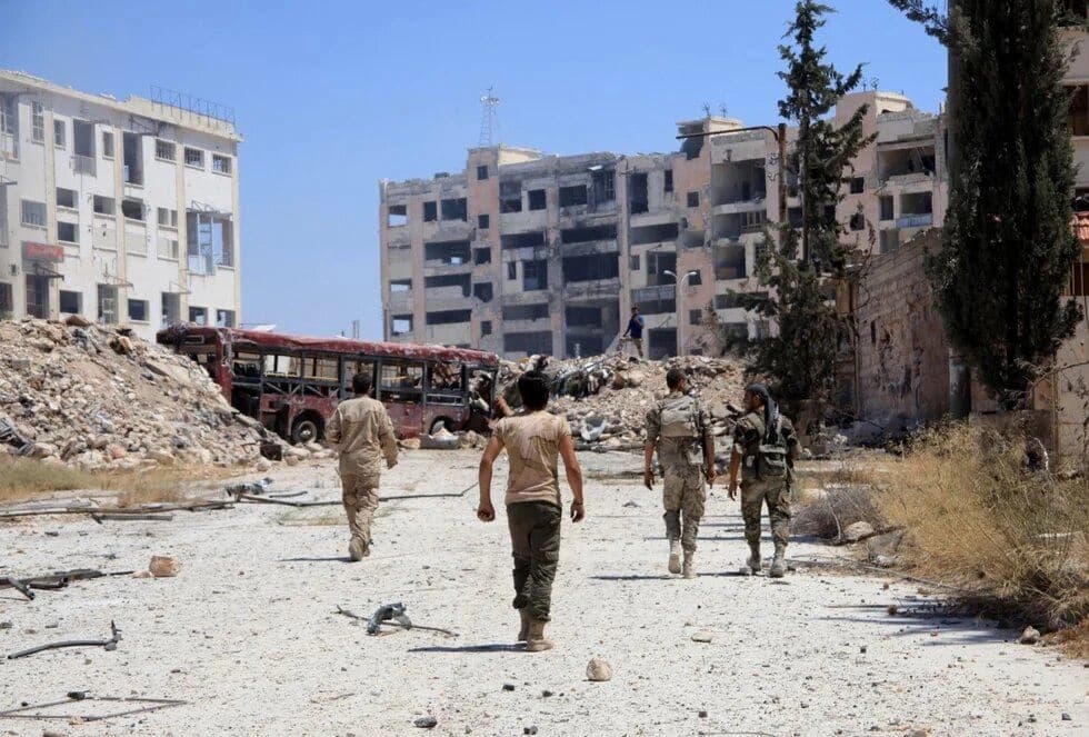 AFP file photo of Syrian government–affiliated forces in Aleppo.
