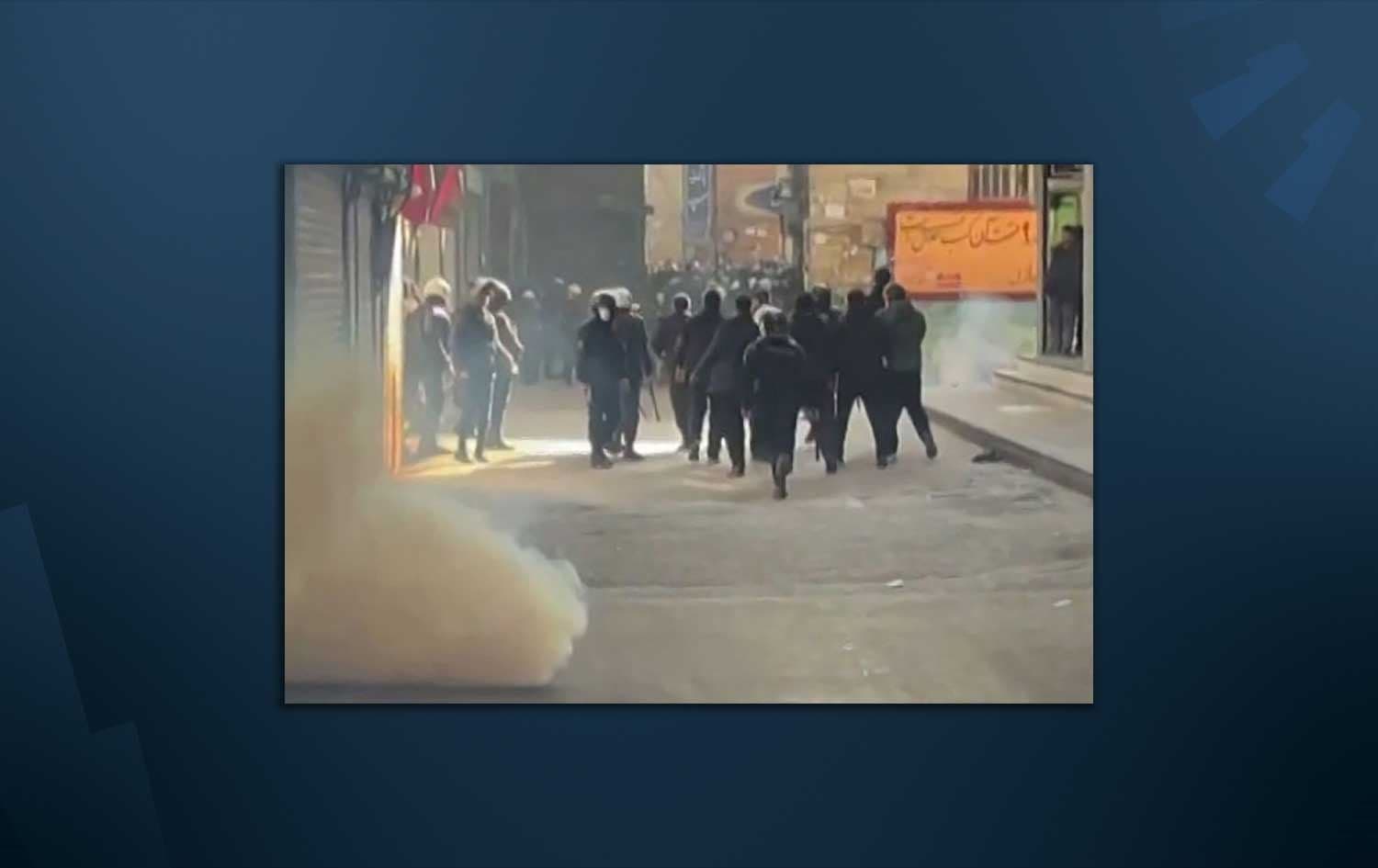 Iranian security forces using tear gas to disperse protesters at the Tehran bazaar on January 6. Photo: Social media via AFP.