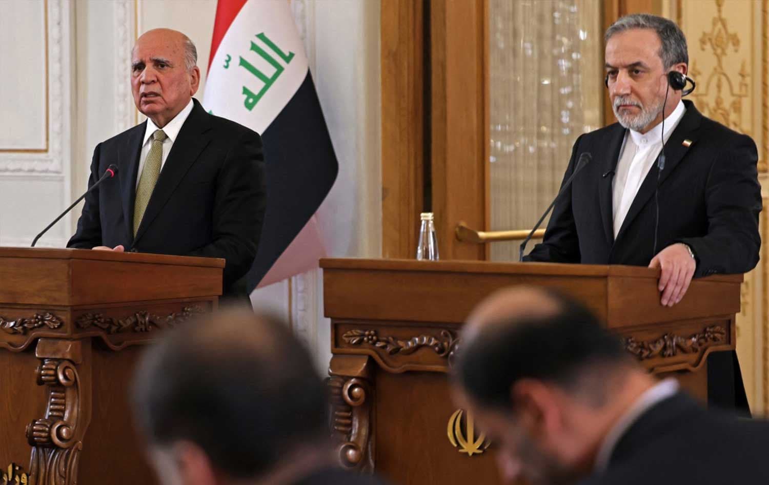 Iranian Foreign Minister Abbas Araghchi (right) and his Iraqi counterpart Fuad Hussein attend a joint press conference in Tehran on January 18, 2026. Photo: AFP