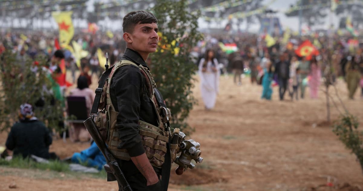 A Syrian Democratic Forces (SDF) fighter stands guard in Qamishli, northeastern Syria. AFP file photo
