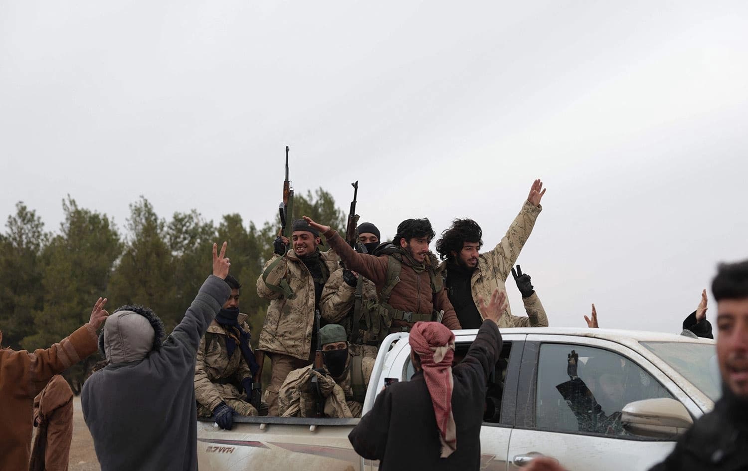 ژمارەیەک چەکداری سەر بە حکومەتی سووریا. وێنە: AFP