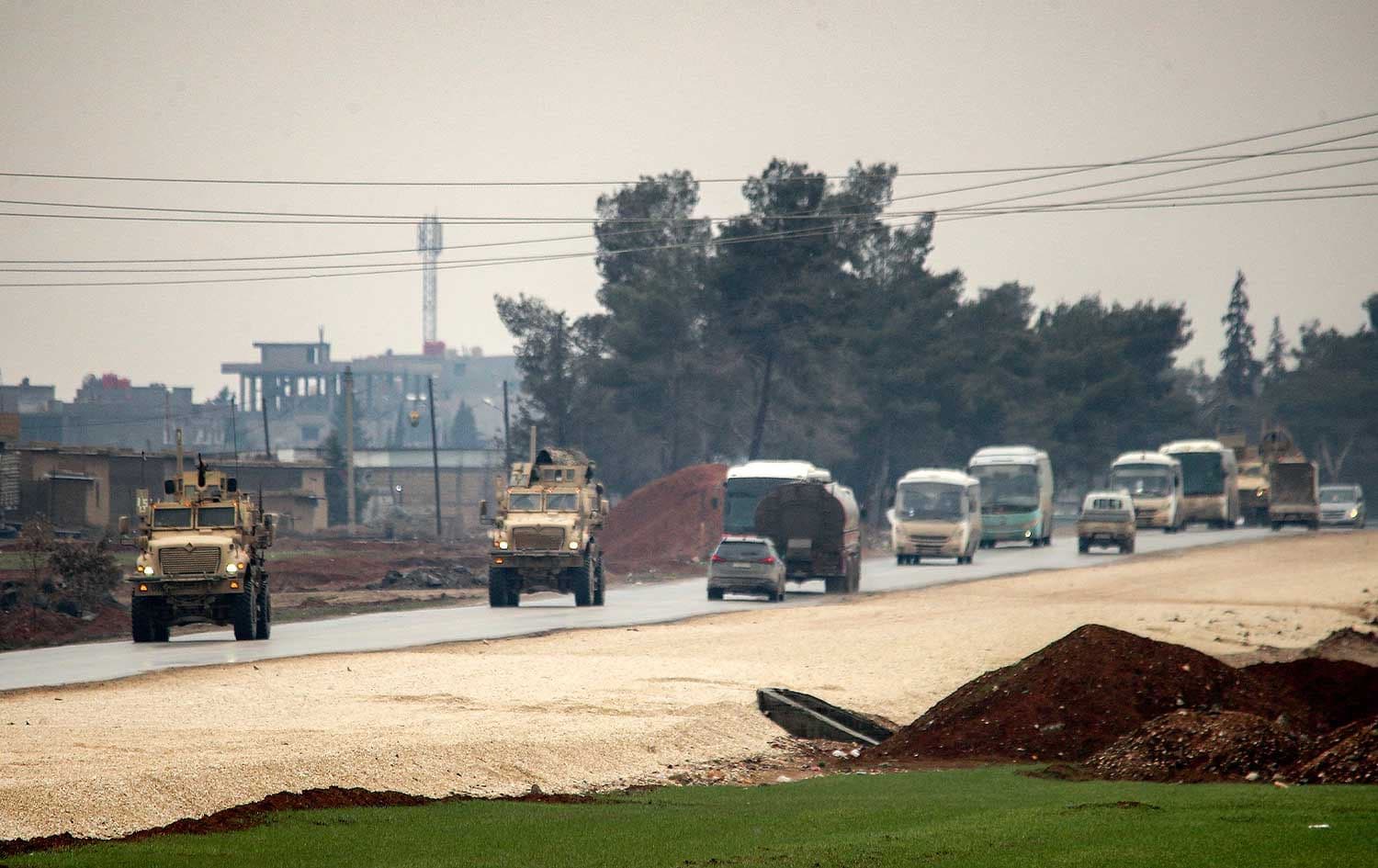 US military vehicles escort a convoy transferring ISIS detainees from Syria to Iraq in Syria’s northeastern Hasaka province on February 7, 2026. Photo: AFP