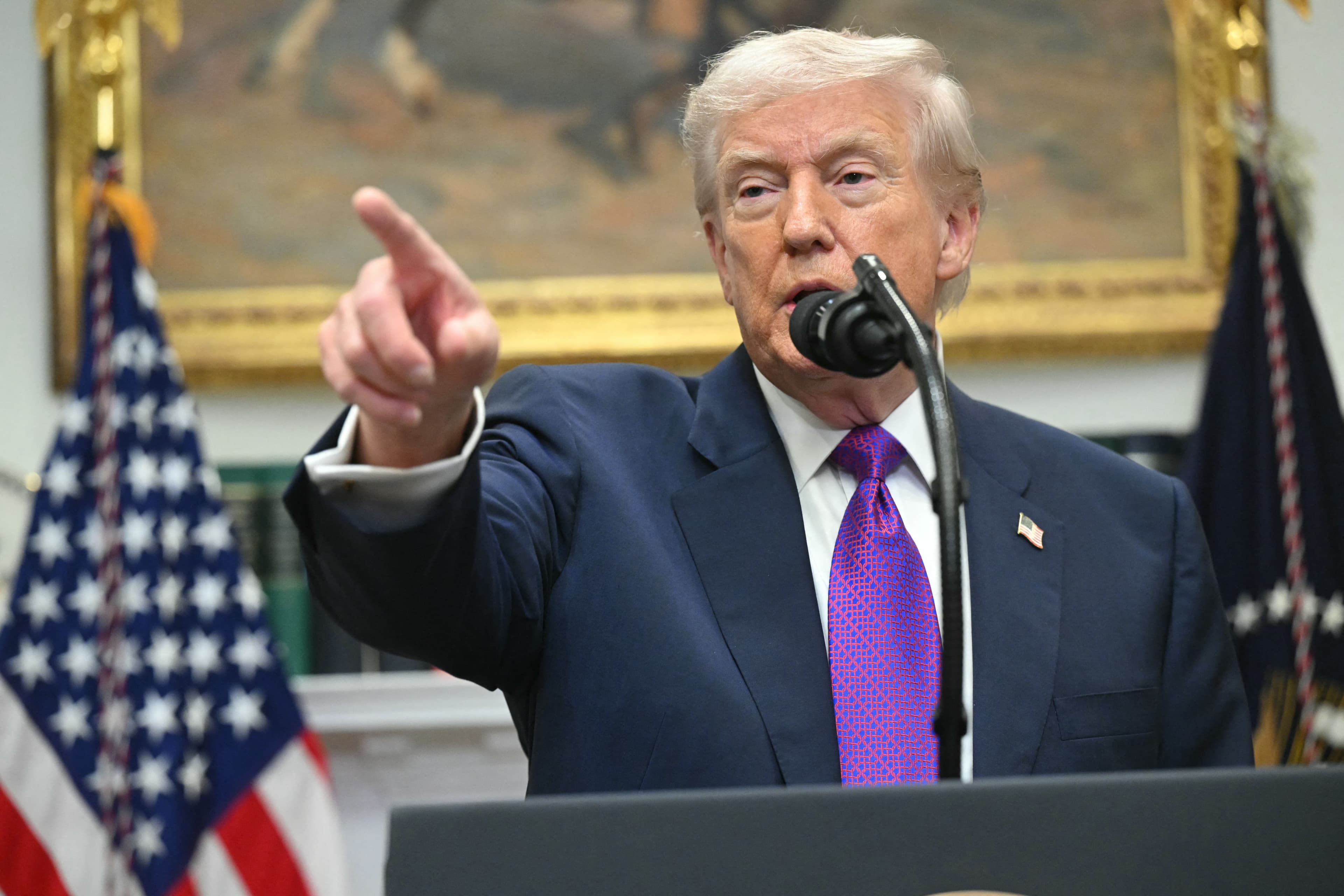 US President Donald Trump takes questions from reporters as after he made an announcement in the Roosevelt Room of the White House in Washington, DC on February 12, 2026. Photo: AFP