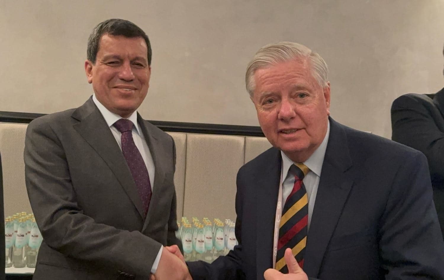 SDF chief Mazloum Abdi (right) meets with US Senator Lindsey Graham on the sidlines of Munich Security Conference on February 14, 2026. Photo: SDF/ Facebook