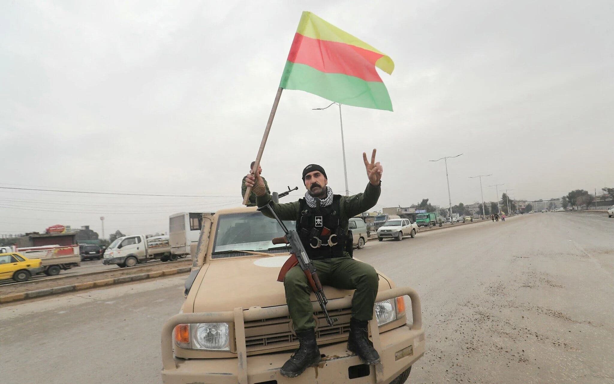 Syrian Democratic Forces (SDF) member flashes the V for victory sign during a demonstration by Syrian Kurds in the city of Hasaka in northeastern Syria, on February 1, 2026. AFP file photo