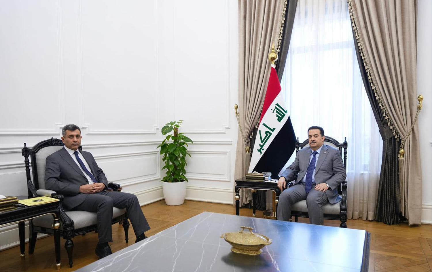 Iraqi Prime Minister Mohammed Shia’ al-Sudani (right) and Iraqi lawmaker Murad Ismael (left) in a meeting on February 21, 2026. Photo: Sudani’s office