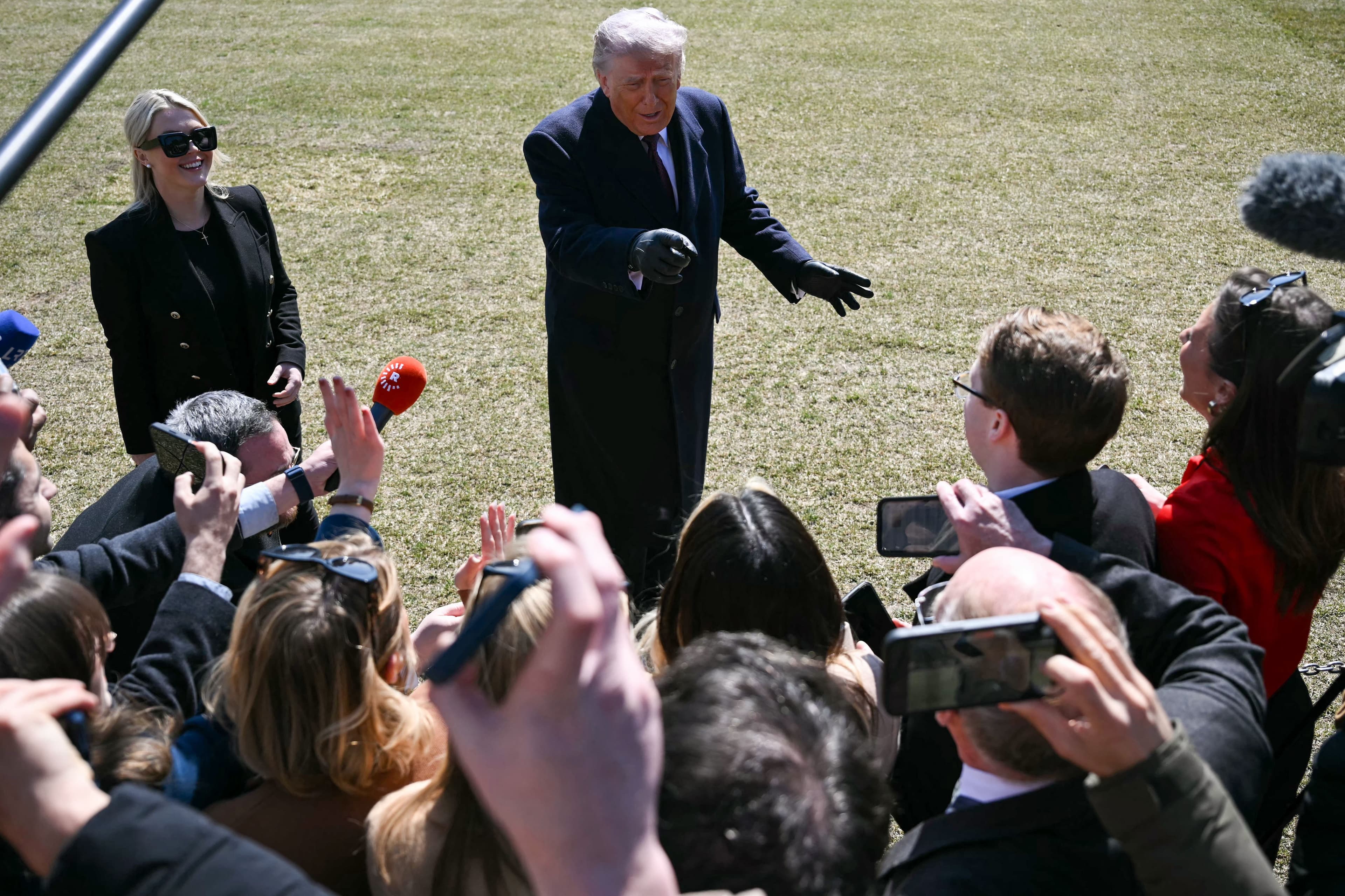 US President Donald Trump speaks to the press before boarding Marine One as he departs from the South Lawn of the White House for Texas in Washington, DC, on February 27, 2026. Photo: AFP