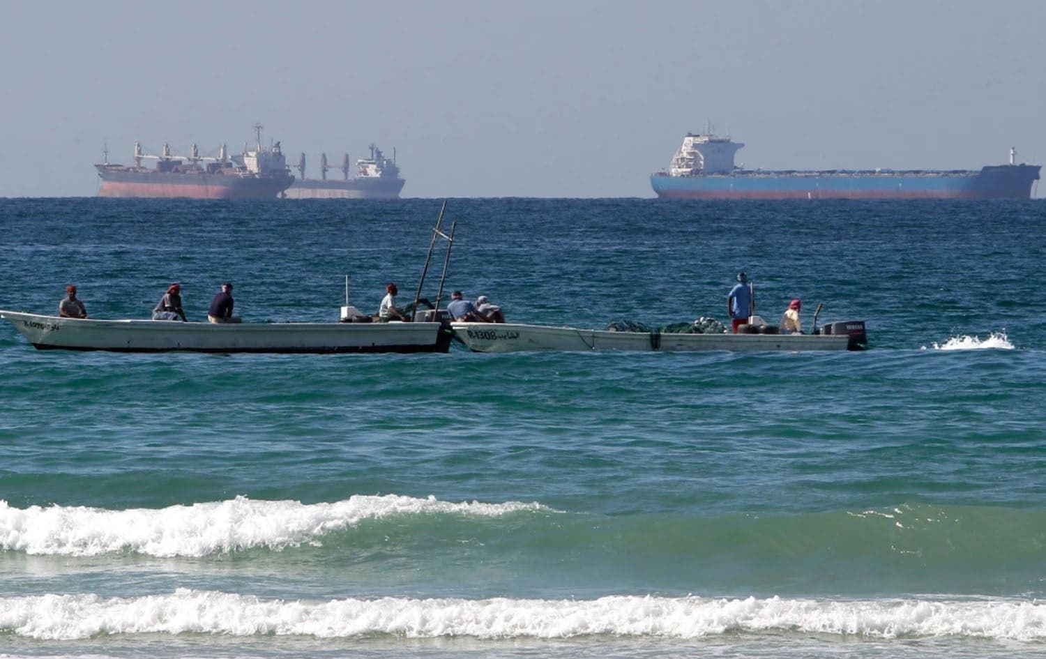 Tankers and fishing boats in the Strait of Hormuz on January 19, 2012. Photo: Kamran Jebreili / AP