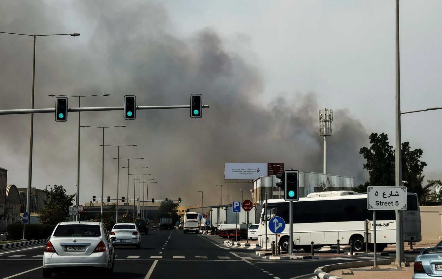 Plume of smoke rises from a reported Iranian strike in the industrial district of Doha, Qatar on March 1, 2026. Photo: AFP