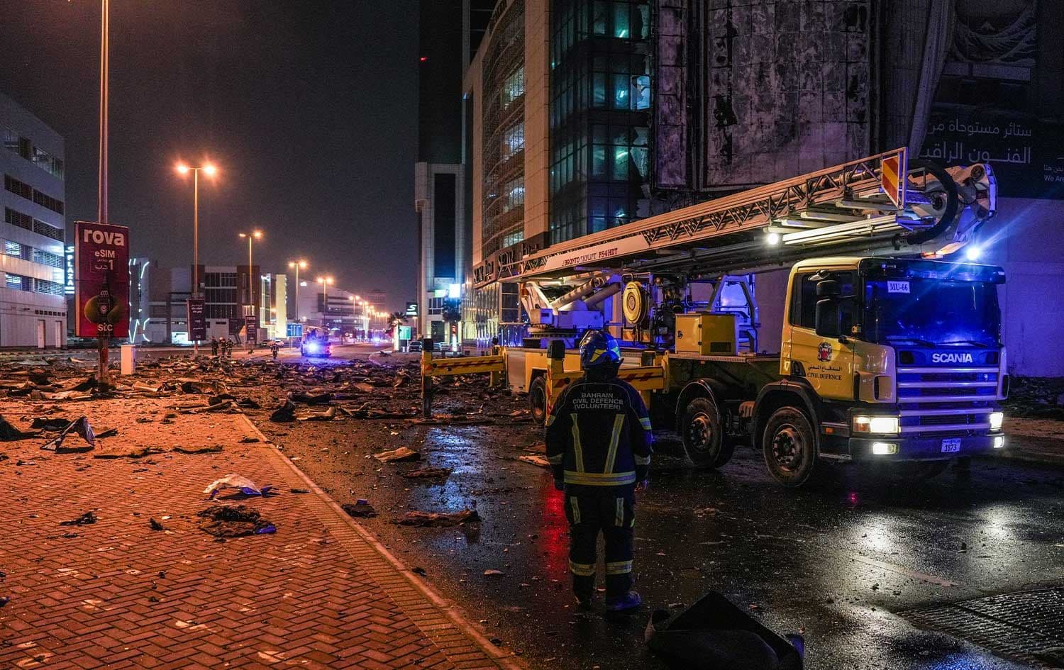 Emergency personnel work to extinguish a fire in a building after an Iranian strike in the capital Manama on February 28, 2026. File photo: AFP