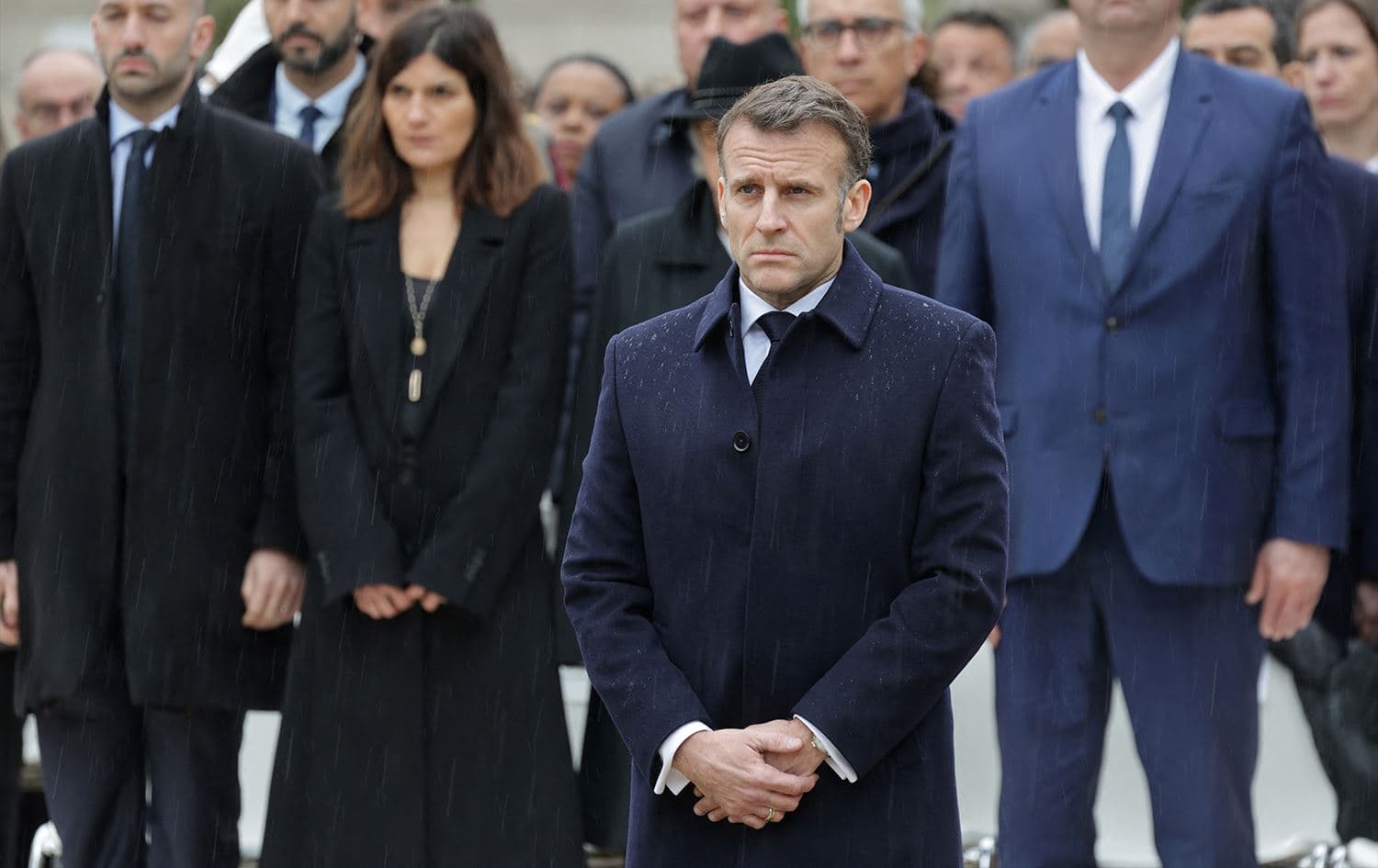French President Emmanuel Macron stands in front of a commemorative fountain during a ceremony paying tribute to the victims of terrorism at Les Invalides in Paris on March 11, 2026. Photo: Ludovic Marin / POOL / AFP