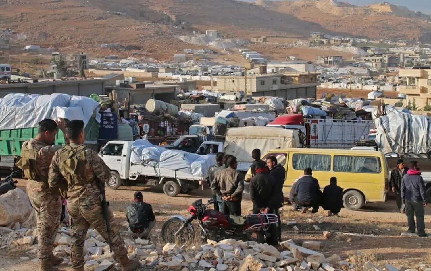 Syrian refugees prepare to leave Lebanon toward Syrian territory through the Wadi Hamid crossing on Oct. 26, 2022. File photo: AFP