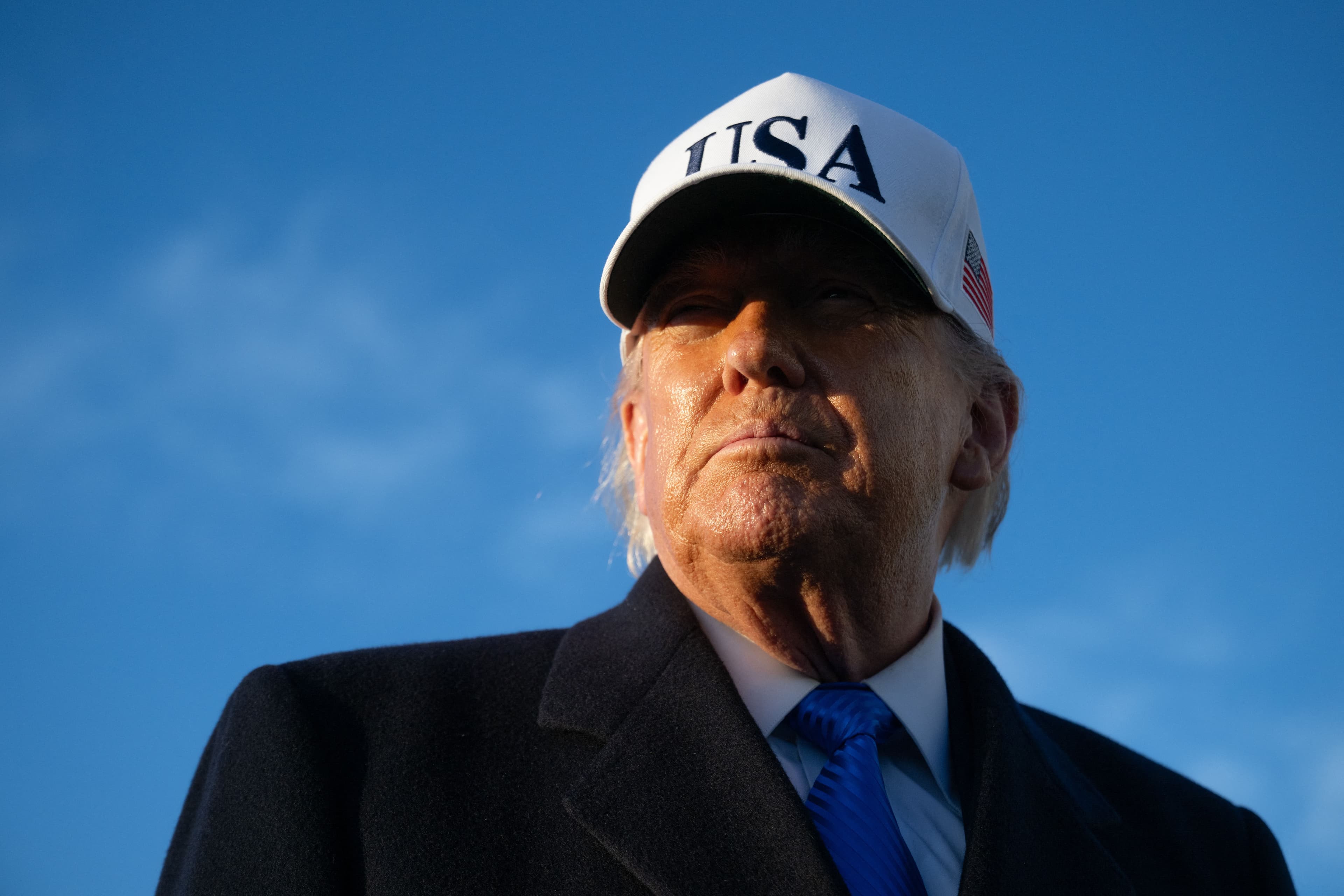 US President Donald Trump speaks to reporters before boarding Air Force One as he departs Joint Base Andrews in Maryland on March 13, 2026. Photo: AFP