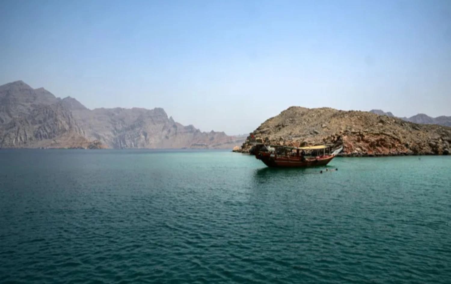 A dhow sails in the waters of the Strait of Hormuz off Khasab in Oman's northern Musandam peninsula on June 25, 2025. AFP file photo