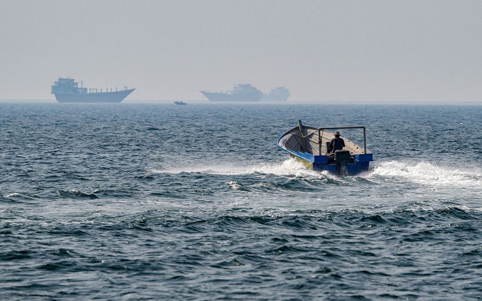 A boat sails in the waters of the Strait of Hormuz off Khasab in Oman’s northern Musandam peninsula on June 25, 2025. Photo: Giuseppe Cacace / AFP