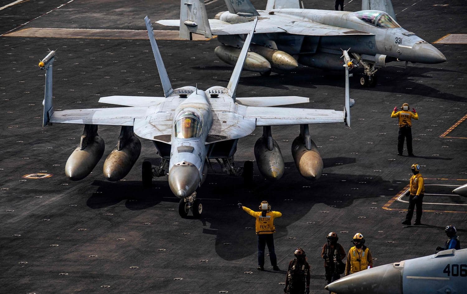 US fighter jets are seen on the flight deck of the USS Gerald R. Ford, March 15, 2026. Photo: AFP