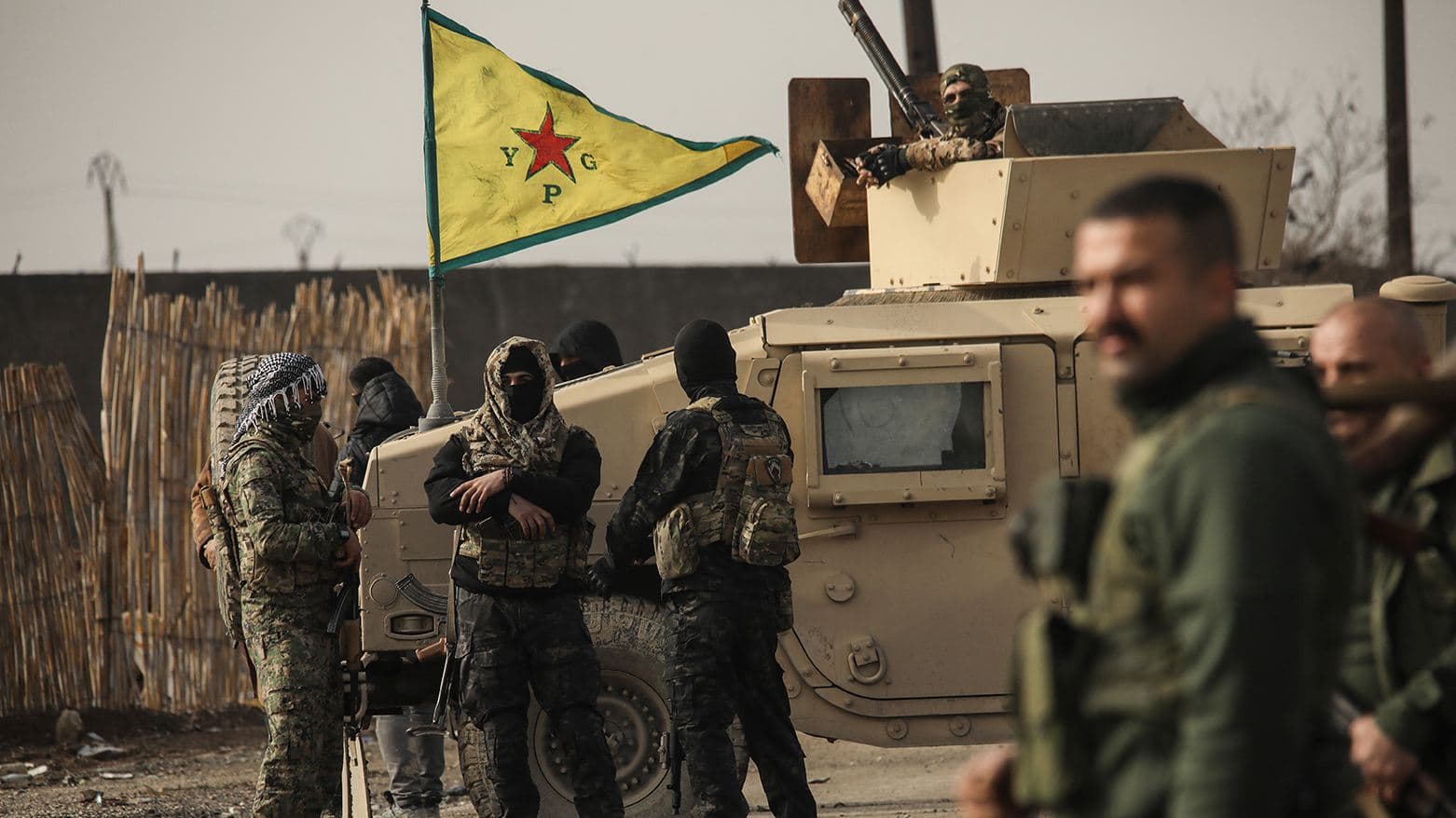 Kurdish-led Syrian Democratic Forces (SDF) stand guard as Syrian government internal security forces enter the city of Hasaka in Rojava in early February 2026. AFP file photo