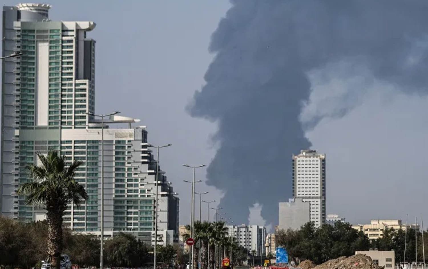 Smoke rises from the direction of an energy installation in the emirate of Fujairah, United Arab Emirates, on March 14, 2026, during the six-week Iran war. Photo: AFP