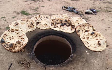 چیای شنگال.. جەنگاوەرانی ئێزدی نان بۆ خۆیان دروستدەکەن