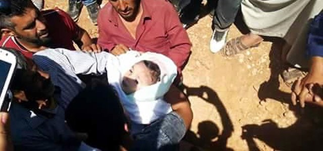 ئالان و دایک و براکەی بە خاکی کۆبانی سپێردران