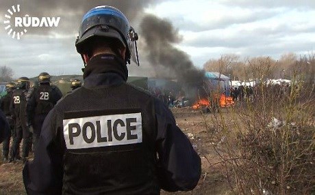 French police dismantle migrant camp at Calais, many Kurds there