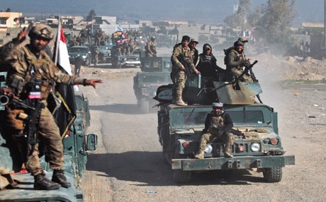 القوات العراقية تقترب من سجن بادوش المركزي غرب مدينة الموصل