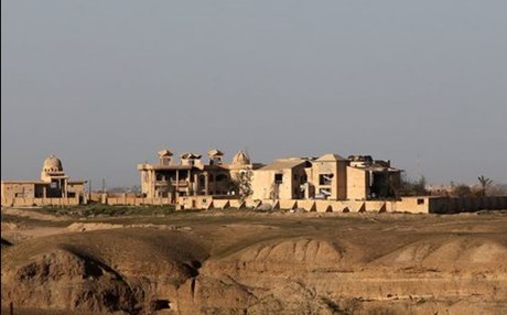 Five suicide bombers kill at least 22 in Iraqi city of Tikrit