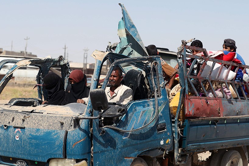 Fotoğraflara Musul’da sivillerin göçü