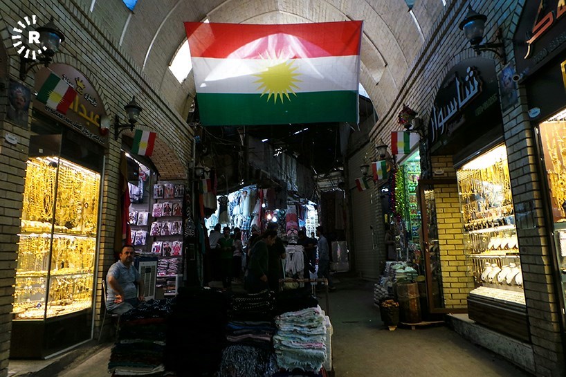Colorful Kurdish flags adorn shops and streets ahead of referendum